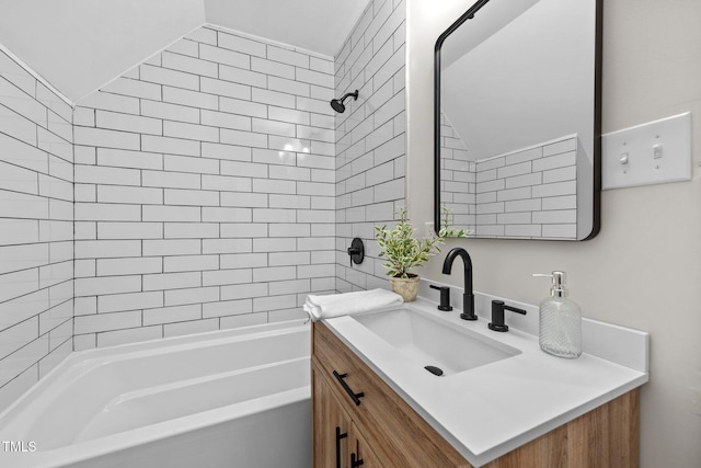 5721 Meadow Run, Knightdale, NC 27545 - full bath featuring vanity, lofted ceiling, and washtub / shower combination