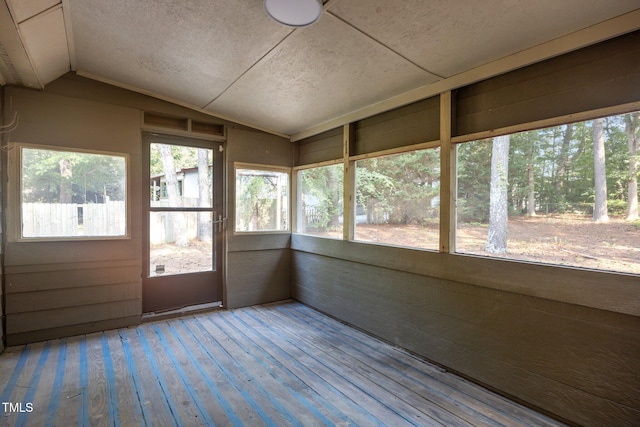 5721 Meadow Run, Knightdale, NC 27545 - unfurnished sunroom featuring lofted ceiling, a textured ceiling, and wood-type flooring