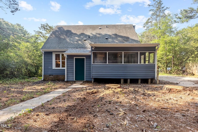 5721 Meadow Run, Knightdale, NC 27545 - rear view of property featuring roof with shingles and a sunroom