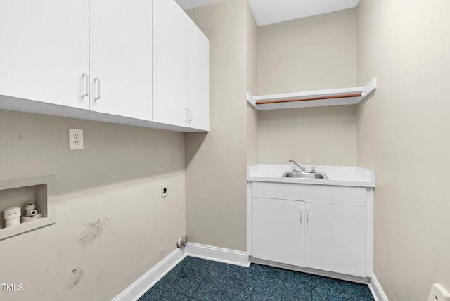 105 Bathgate Ln, Cary, NC 27513 - laundry room featuring cabinet space, electric dryer hookup, dark floors, and hookup for a washing machine