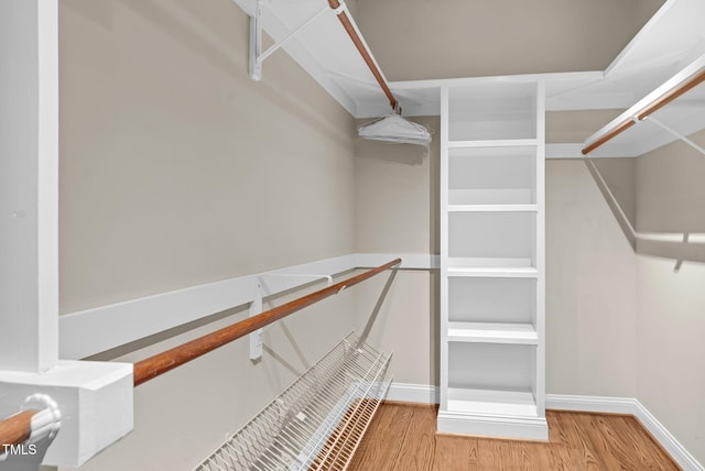 105 Bathgate Ln, Cary, NC 27513 - spacious closet featuring wood finished floors