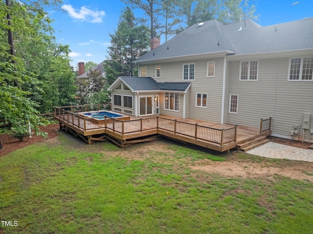 105 Bathgate Ln, Cary, NC 27513 - back of house featuring a yard, a sunroom, and a wooden deck