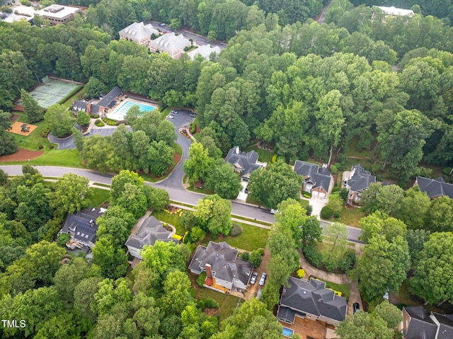105 Bathgate Ln, Cary, NC 27513 - aerial view of property and surrounding area featuring nearby suburban area and a heavily wooded area