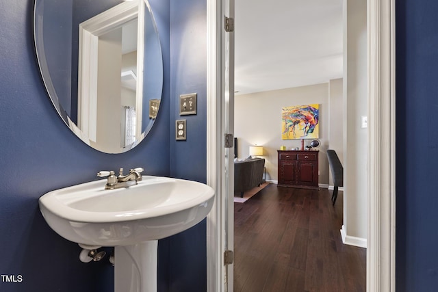 8205 Rolling Glenn Dr, Raleigh, NC 27616 - bathroom with hardwood / wood-style flooring and baseboards