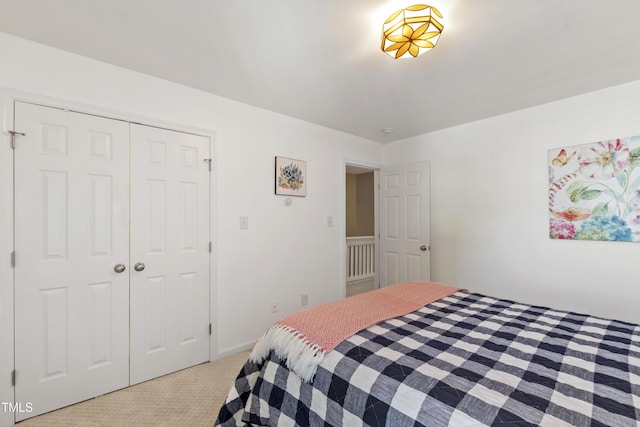 8205 Rolling Glenn Dr, Raleigh, NC 27616 - bedroom with carpet floors and a closet