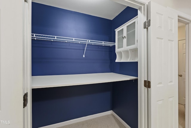 8205 Rolling Glenn Dr, Raleigh, NC 27616 - walk in closet featuring carpet floors