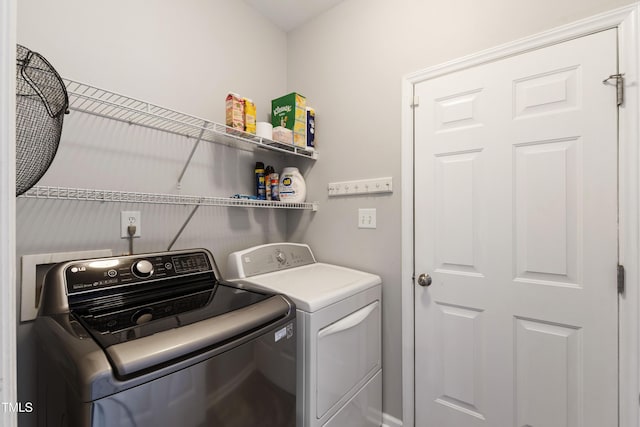 8205 Rolling Glenn Dr, Raleigh, NC 27616 - laundry room featuring washing machine and clothes dryer