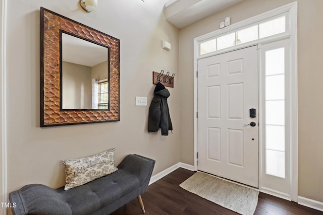 8205 Rolling Glenn Dr, Raleigh, NC 27616 - entryway featuring baseboards and dark wood-style flooring