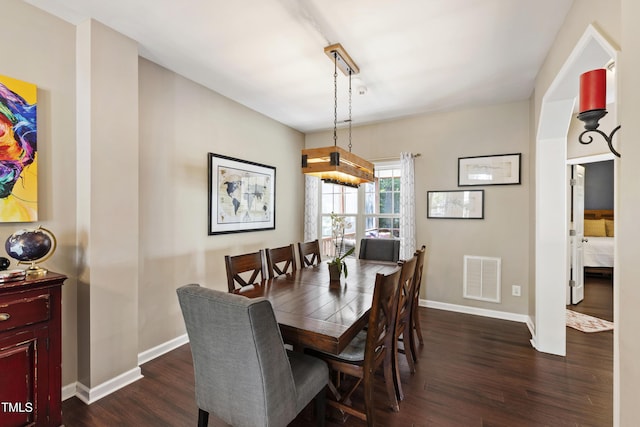 8205 Rolling Glenn Dr, Raleigh, NC 27616 - dining room featuring dark wood finished floors and baseboards