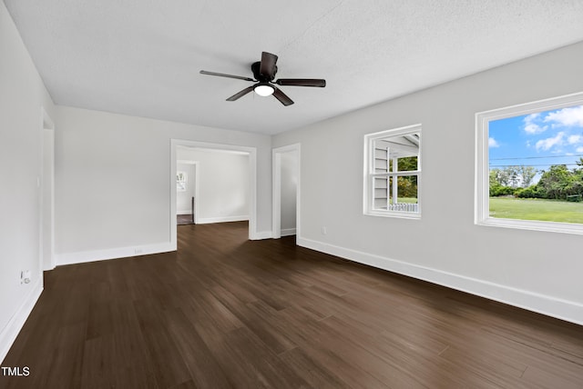 208 Fairview Ave SW, Wilson, NC 27893 - spare room featuring dark wood-style floors and a ceiling fan