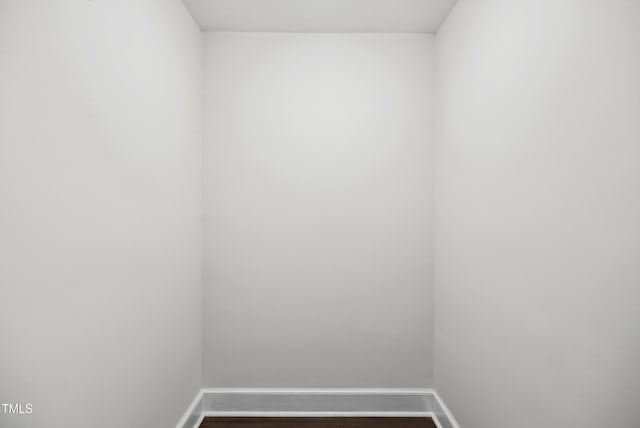 208 Fairview Ave SW, Wilson, NC 27893 - unfurnished room featuring dark wood finished floors and baseboards