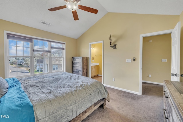 1968 Shadow Glen Dr, Raleigh, NC 27604 - bedroom with vaulted ceiling, carpet, a ceiling fan, and connected bathroom