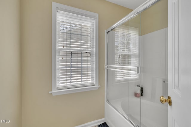 1968 Shadow Glen Dr, Raleigh, NC 27604 - bathroom with shower / bath combination with glass door and baseboards