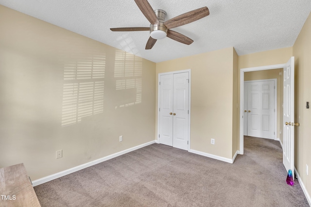 1968 Shadow Glen Dr, Raleigh, NC 27604 - unfurnished bedroom with a textured ceiling, carpet floors, a closet, and a ceiling fan