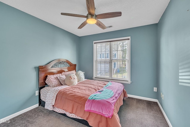1968 Shadow Glen Dr, Raleigh, NC 27604 - carpeted bedroom with a ceiling fan and a textured ceiling