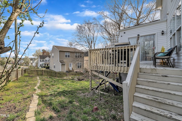 1968 Shadow Glen Dr, Raleigh, NC 27604 - fenced backyard featuring stairway, a deck, and a residential view