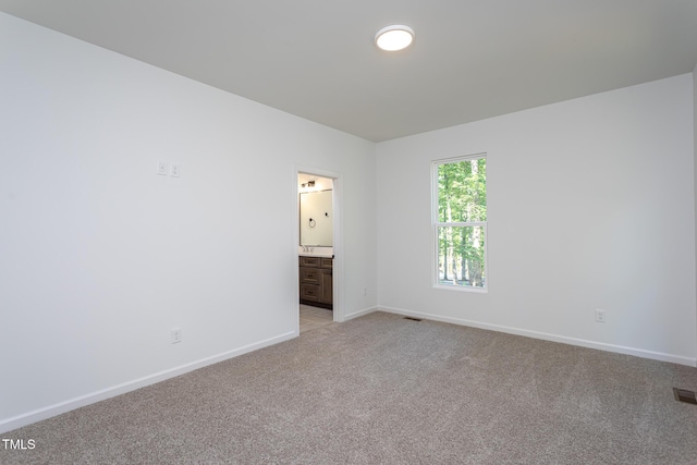6069 Jones Cir, Sanford, NC 27332 - empty room featuring light colored carpet and baseboards
