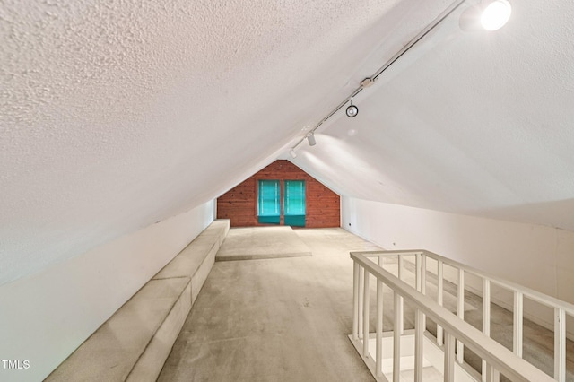 711 W Club Blvd, Durham, NC 27701 - bonus room with a textured ceiling, carpet floors, lofted ceiling, and wood walls