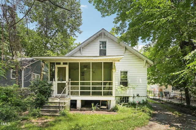 711 W Club Blvd, Durham, NC 27701 - rear view of house featuring a sunroom