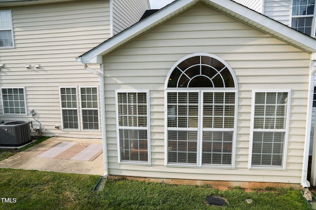 3423 Van Hessen Dr, Raleigh, NC 27614 - view of home's exterior featuring a central AC unit and a patio