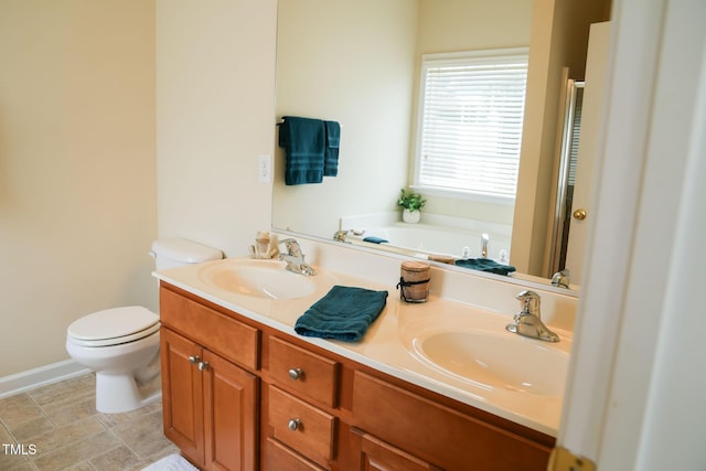 3423 Van Hessen Dr, Raleigh, NC 27614 - full bathroom with double vanity, a stall shower, and a garden tub