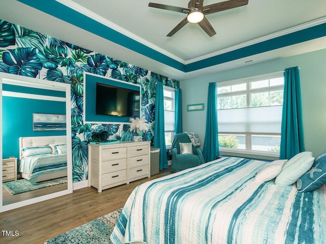 67 Blue Spruce Cir, Clayton, NC 27527 - bedroom featuring wood finished floors, crown molding, and a ceiling fan