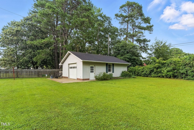 1015 S 1st St, Smithfield, NC 27577 - view of yard featuring an outdoor structure and a garage