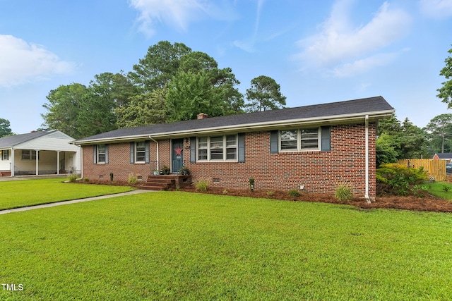 1015 S 1st St, Smithfield, NC 27577 - ranch-style house with brick siding, a front yard, a chimney, and crawl space