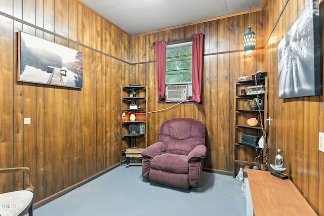 1015 S 1st St, Smithfield, NC 27577 - living area featuring wood walls, cooling unit, and concrete flooring