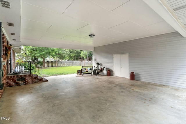 1015 S 1st St, Smithfield, NC 27577 - view of patio featuring an attached carport