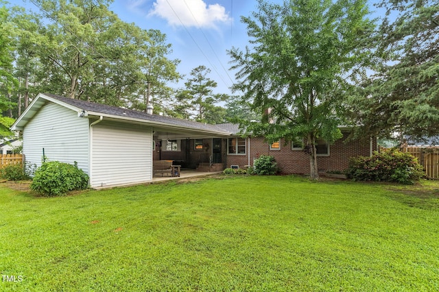 1015 S 1st St, Smithfield, NC 27577 - back of property with a patio