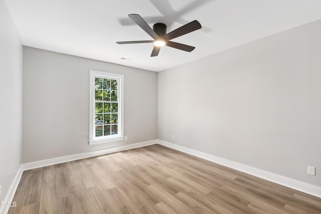 1609 Falls Ct, Raleigh, NC 27615 - empty room with light wood-style flooring and a ceiling fan