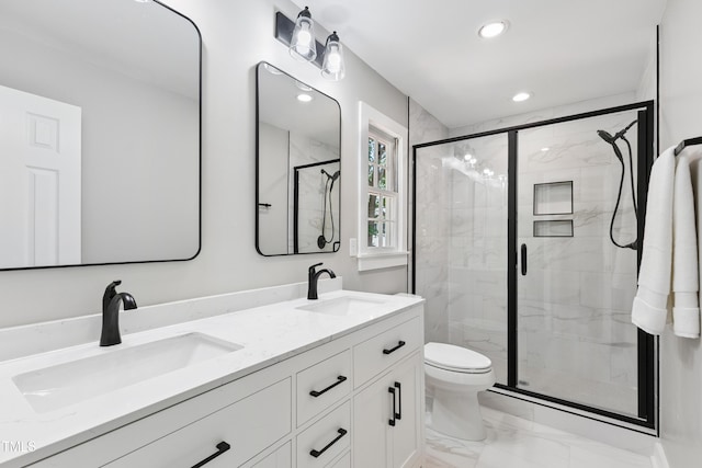 1609 Falls Ct, Raleigh, NC 27615 - full bath featuring marble finish floors, a stall shower, double vanity, and recessed lighting