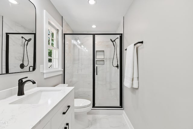1609 Falls Ct, Raleigh, NC 27615 - bathroom featuring marble finish floors, recessed lighting, vanity, and a marble finish shower