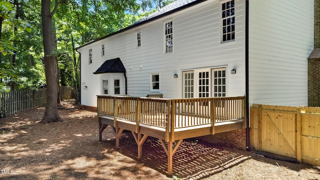 1609 Falls Ct, Raleigh, NC 27615 - rear view of house featuring a wooden deck and a gate