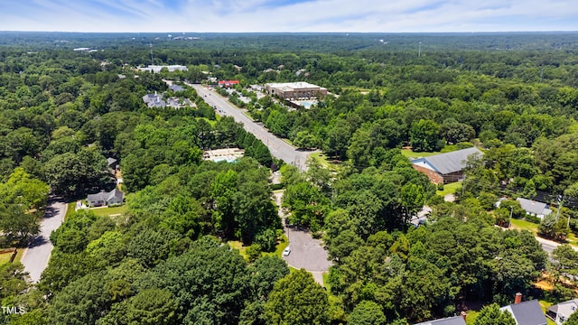 1609 Falls Ct, Raleigh, NC 27615 - aerial view of a heavily wooded area