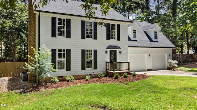 1609 Falls Ct, Raleigh, NC 27615 - colonial-style house featuring driveway, a shingled roof, a garage, crawl space, and a chimney