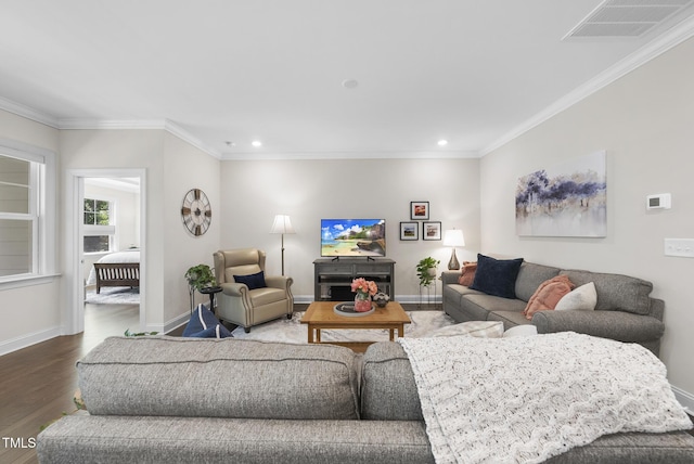 1125 Surveyor Dr, Durham, NC 27703 - living area featuring wood finished floors, recessed lighting, and crown molding