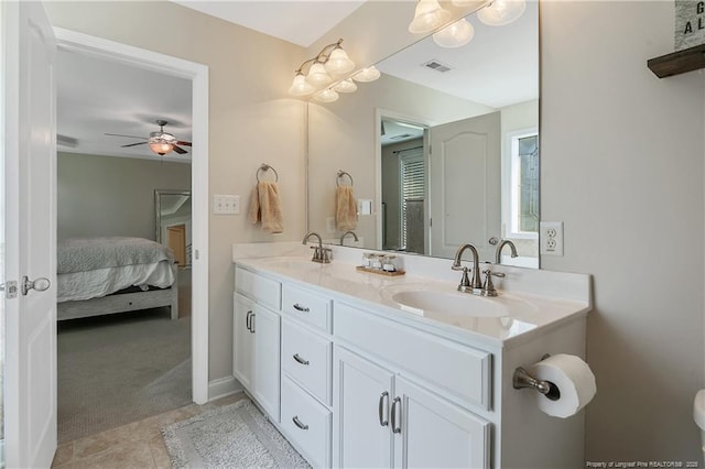 123 Sorrel Ct, Raeford, NC 28376 - ensuite bathroom with double vanity, ceiling fan, and tile patterned floors