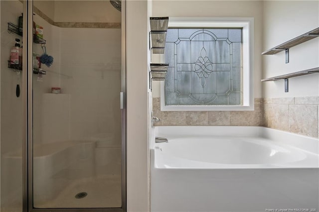 123 Sorrel Ct, Raeford, NC 28376 - bathroom with a stall shower and a bath
