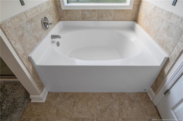 123 Sorrel Ct, Raeford, NC 28376 - bathroom featuring a bath and healthy amount of natural light