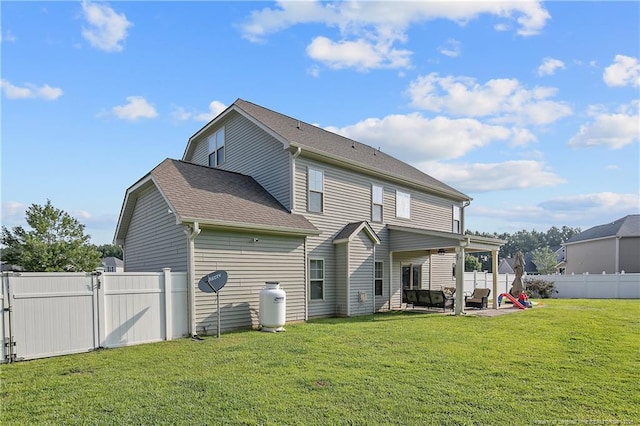 123 Sorrel Ct, Raeford, NC 28376 - back of house featuring a fenced backyard, a patio, a gate, a shingled roof, and an outdoor living space