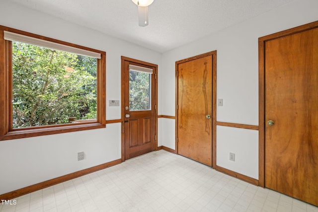 601 Wofford Rd, Durham, NC 27707 - unfurnished room with a textured ceiling and light flooring
