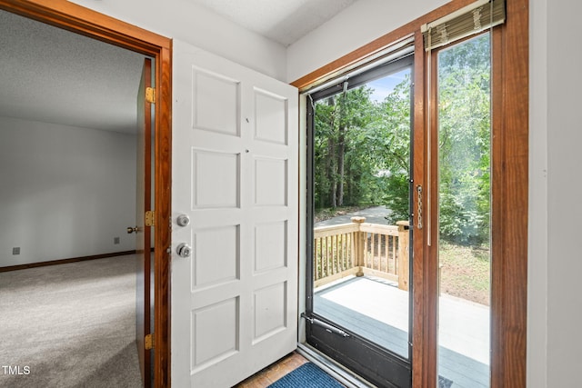 601 Wofford Rd, Durham, NC 27707 - entryway featuring baseboards and carpet flooring