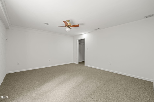 601 Wofford Rd, Durham, NC 27707 - carpeted spare room featuring ceiling fan and ornamental molding