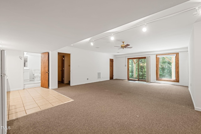 601 Wofford Rd, Durham, NC 27707 - unfurnished living room featuring carpet, ceiling fan, and track lighting