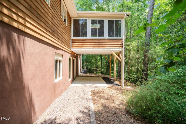 601 Wofford Rd, Durham, NC 27707 - view of side of property featuring a patio and stucco siding