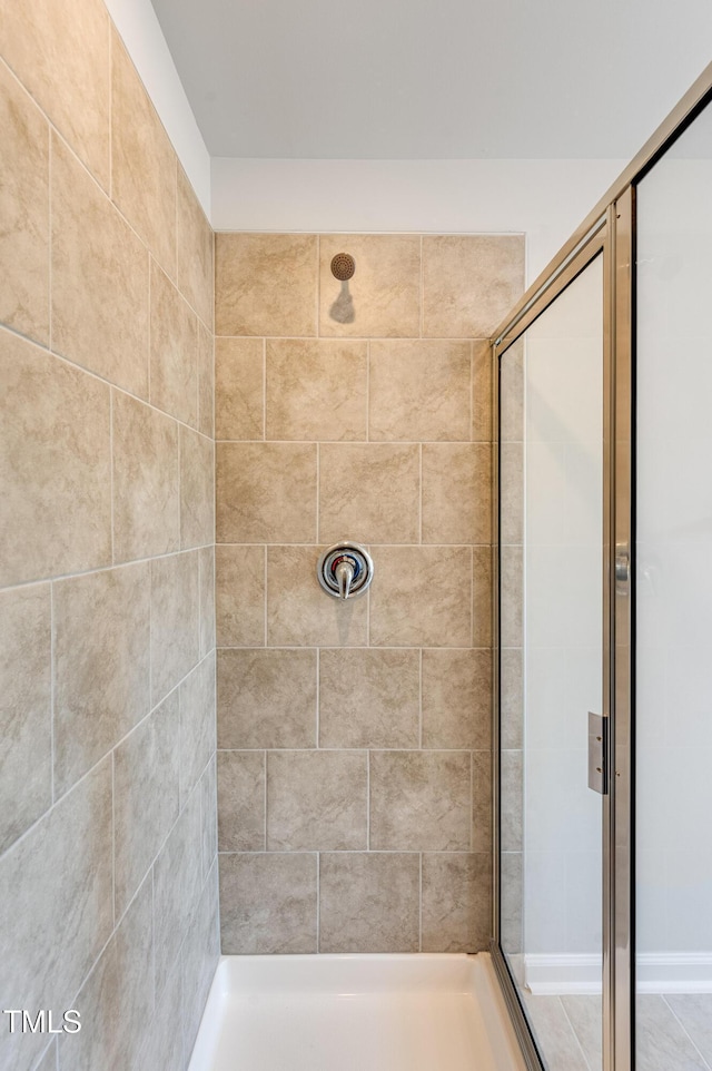 3113 Vitner Dr, Durham, NC 27704 - bathroom featuring a stall shower