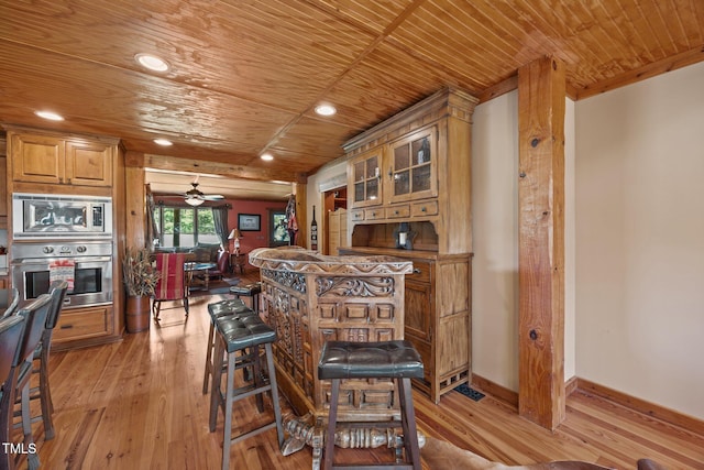 indoor dry bar featuring stainless steel appliances, wood ceiling, light wood-style flooring, ceiling fan, and recessed lighting