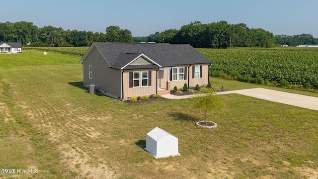 82 Mamie Rd, Benson, NC 27504 - view of front of property with a front lawn and a view of countryside